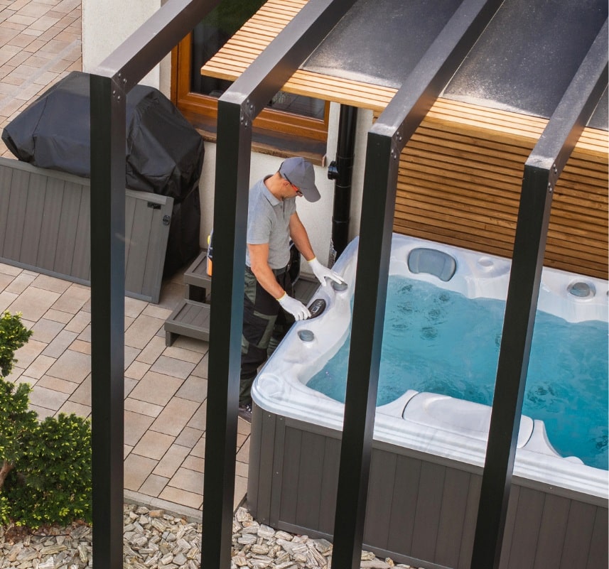 installing a hot tub man installing a hot tub